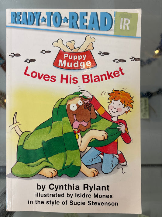 Puppy Mudge loves his blanket